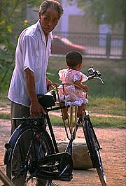 man-with-granddaughter-on-bike