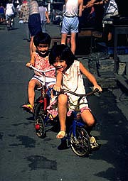 two-girls-on-bike
