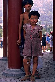 children-picking-bottles