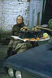 Babushka selling potato