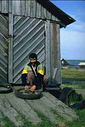 Man fixing bike weel